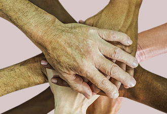 Hands in a pile