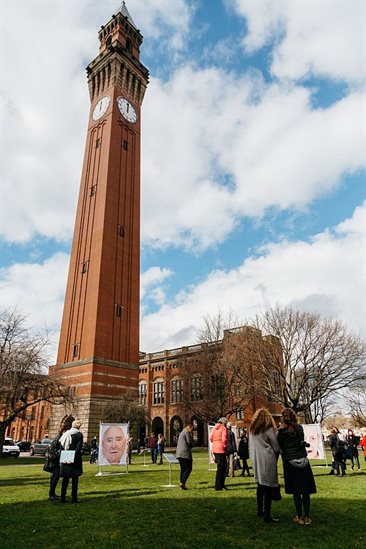 Old Joe towers over the Black Country Lungs exhibition situated in Chancellor's Court, as people look at the exhibits
