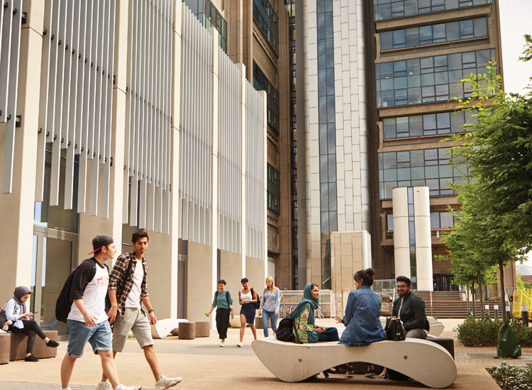 Students outside the Alan Walters Building