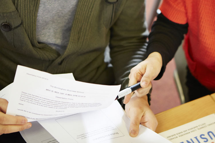 Researchers sharing notes