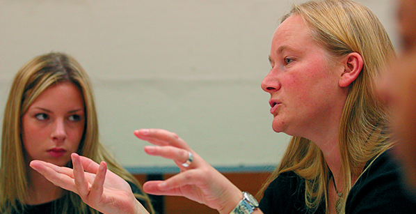 Female academic talking to a group
