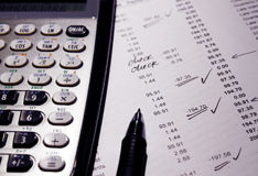 A calculator and notepad