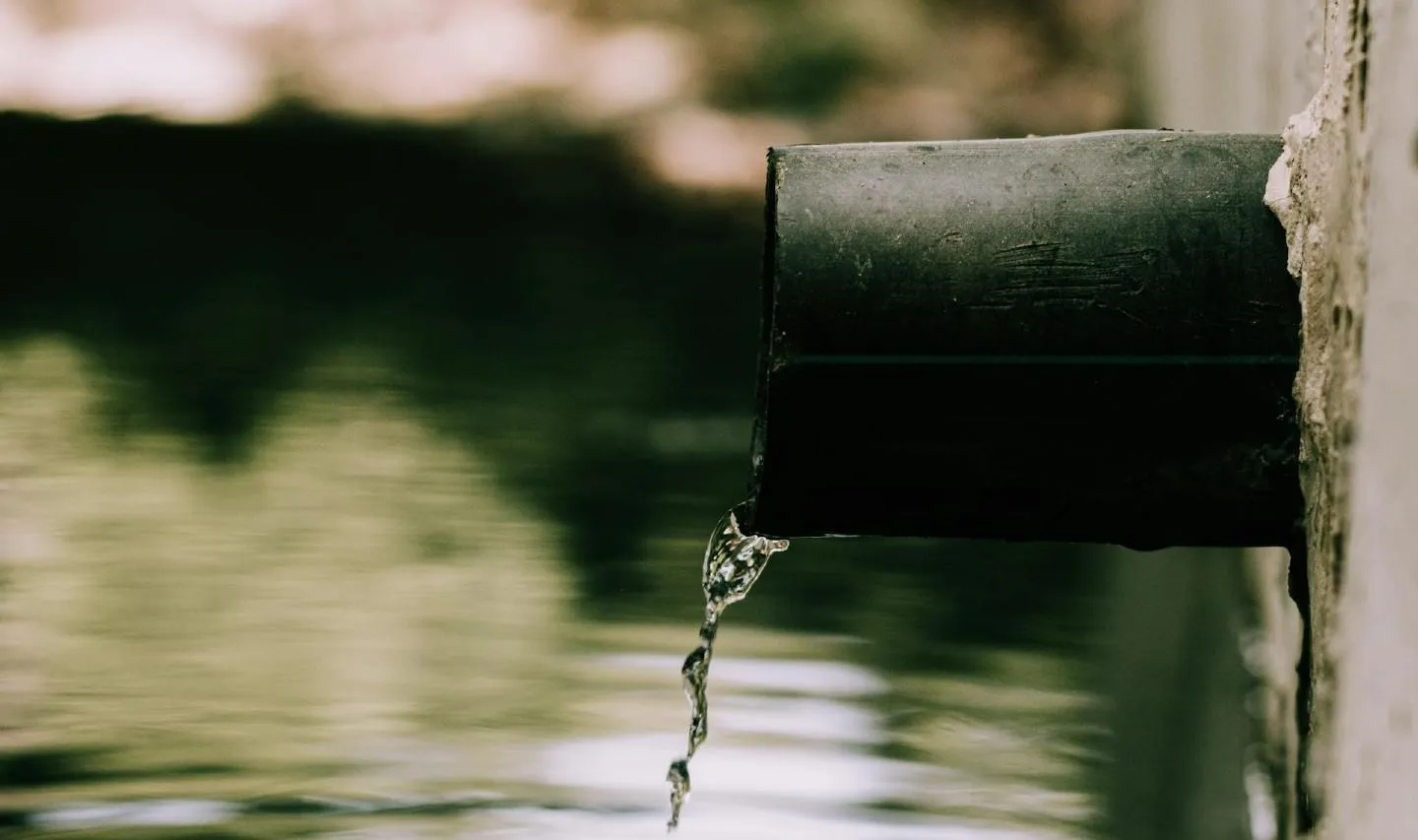 Water trickling out of pipe